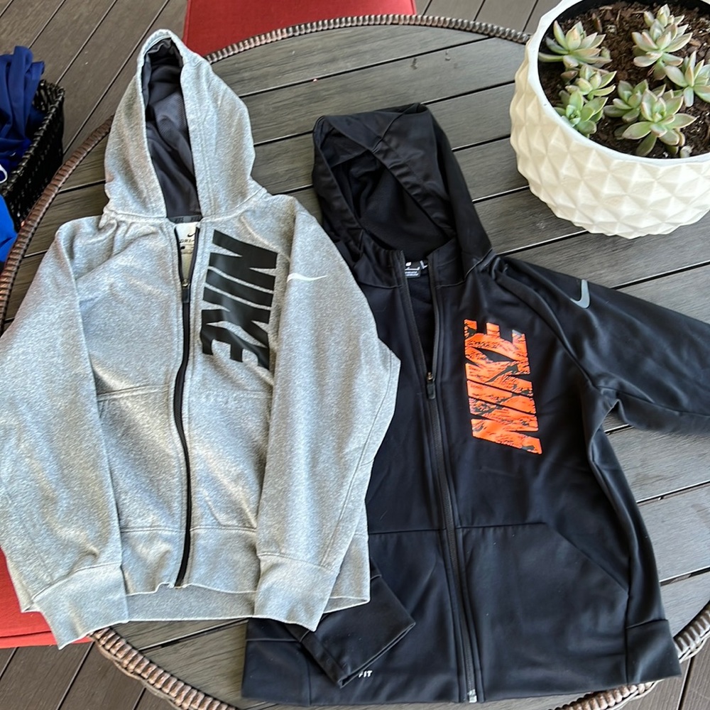 Kids large Nike zip up hoodies